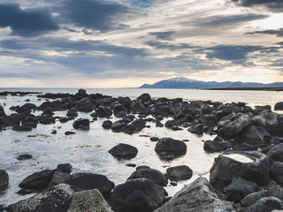 scenic landscape with ocean, rocks and clouds, Dritvik Djupalonssandur, Iceland