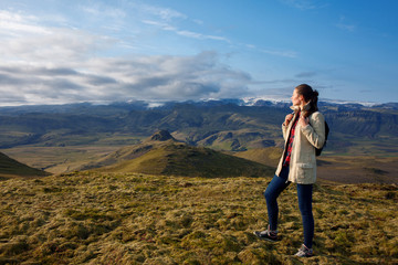 Naklejka premium Attractive girl tourist on background of mountain landscape