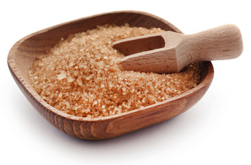 Brown sugar with wooden scoop