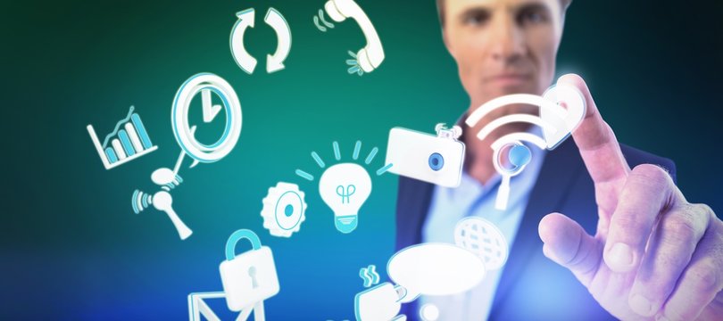 Composite image of businessman pressing an invisible virtual