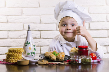 funny boy chef prepares meatballs