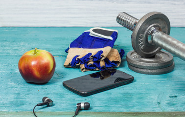 Sport Equipment. Dumbbells, Free Weights, Sport Gloves, Phone With Earphones