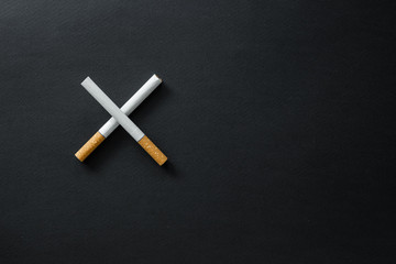 Cigarettes on a dark background.