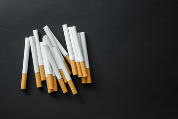 Cigarettes on a dark background.