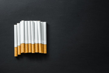 Cigarettes on a dark background.
