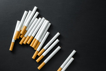 Cigarettes on a dark background.