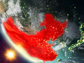 Sunset above China on Earth