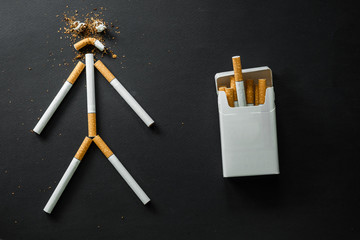 Cigarette on a dark background. quit Smoking