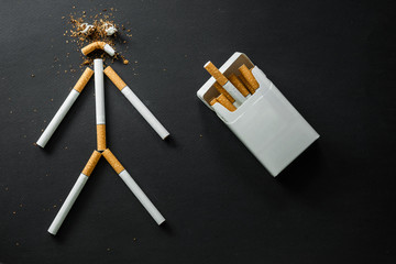 Cigarette on a dark background. quit Smoking