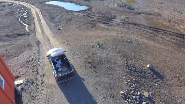 Top view of a traveling pickup truck on off road. Andreev.