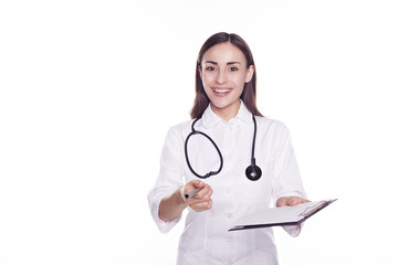 Please sign. Smiling female doctor with stethoscope and tablet in hands over white background