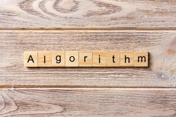 Algorithm word written on wood block. Algorithm text on table, concept