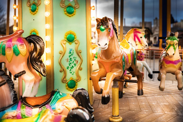 merry go round horse carousel ride at amusement park