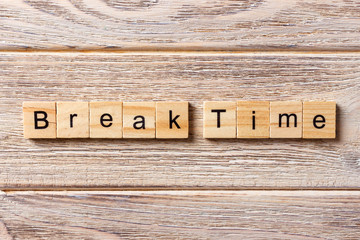 Break time word written on wood block. Break time text on table, concept