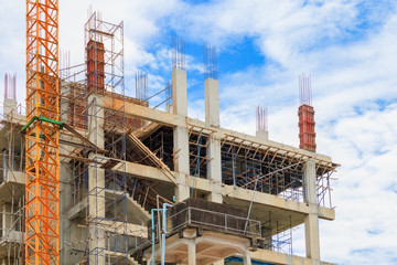 working and Crane  in big construction site in develop city with copy space add text