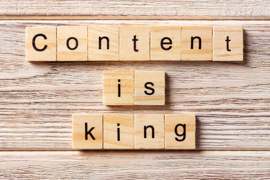 Content Is King word written on wood block. Content Is King text on table, concept