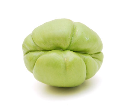 Chayote also known as chow chow and many other names isolated on white.