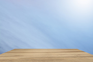 Empty perspective room with sparkling blue sky lighting.Template mock up for display of your product.