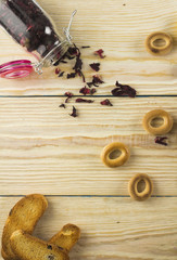 Cup of tea and leaves tea on white wooden table