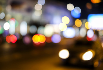 Abstract blurred bokeh background of car light on road in the city