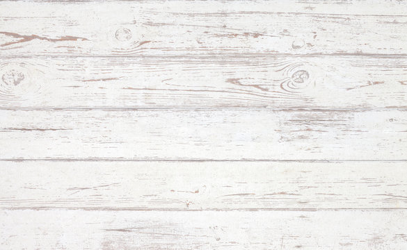 Grunge background. White wooden texture.  Peeling paint on an old wooden floor.