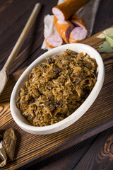 Cabbage stew with meat, mushrooms and dried plums - traditional polish dish