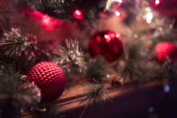 Fototapeta na wymiar Festive Christmas Wreath Over a Fireplace