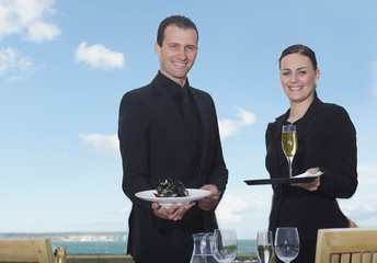 Man and woman smiling to camera
