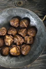Chestnuts on wooden background