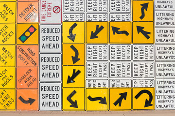 Multiple street warning direction signs