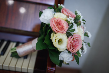 tender bouquet on the piano