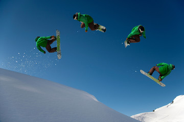 Snowboarder dangerous free ride jump