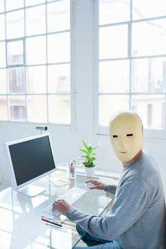 Man In Crash Test Dummy Mask In An Office