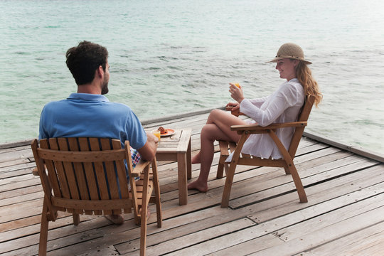 Couple Eating Together On Deck