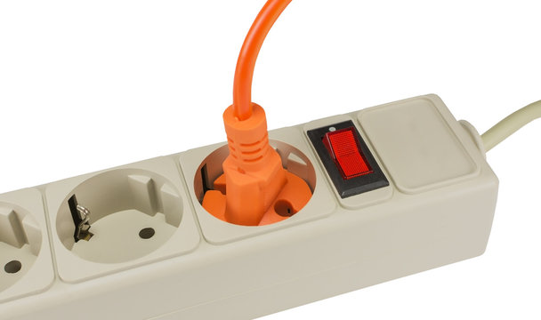 electrical plug in the electric socket on white