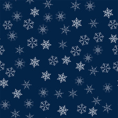 Christmas seamless pattern from snowflakes. New year festive texture for design postcards, invitations, greetings, and clothing.