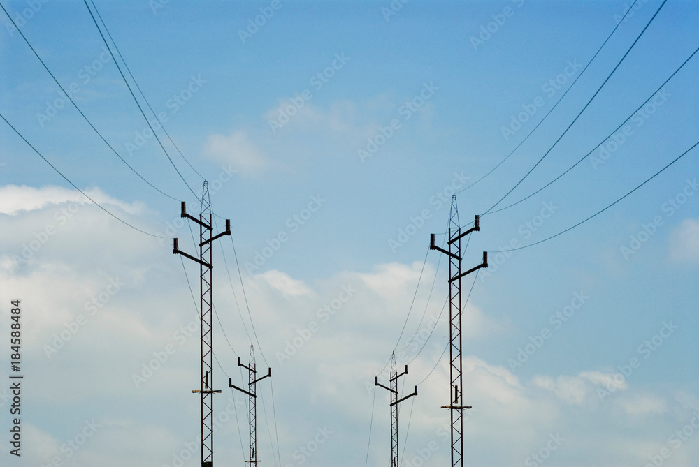 Wall mural power lines against blue sky - Wall murals