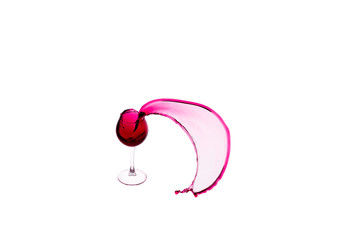 Wineglass with red wine on white isolated background