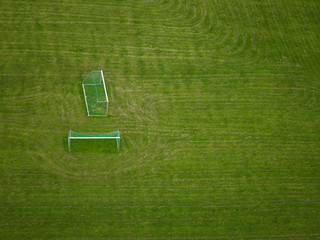 Aerial view of discarded soccer goals © Image Source RF