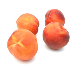 Fototapeta na wymiar Peaches on white background