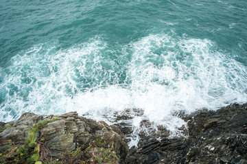 Sea waves crashing on the rock.
