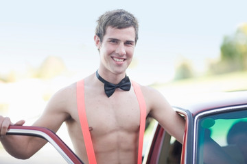 Teenage boy in bow tie and suspenders