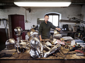 Blacksmith with armor in shop