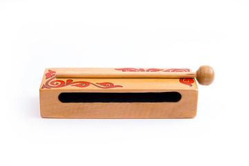Kazakh traditional woodblock. 
Closeup of a woodblock and a mallet with kazakh traditional...