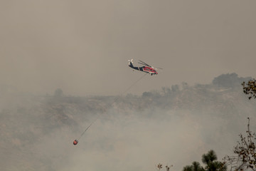 Helicopter Flies Over Fire and Smoke in California