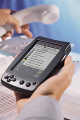 Person using pocket PC
