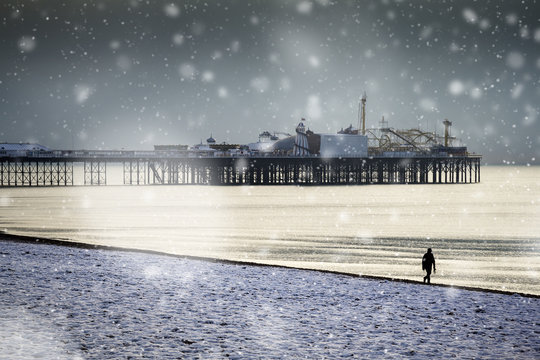 Brighton pier and seafront snowy scene