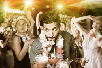 Man enjoying hawaiian party