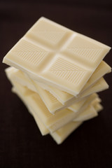 White chocolate bars in a pile