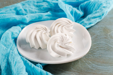 Fresh delicious white meringue cookies
